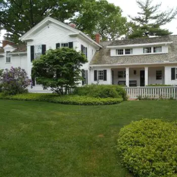 White house with shingle roof