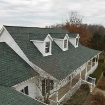 Green shingle residential roof installation