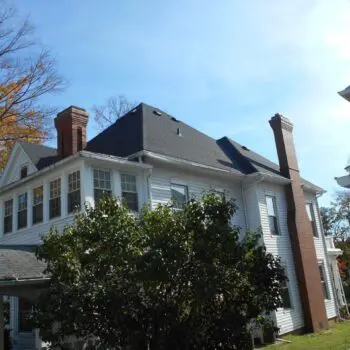 Residential roofing with chimney stacks