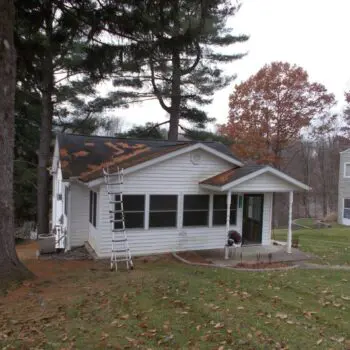 House with brown roof damage