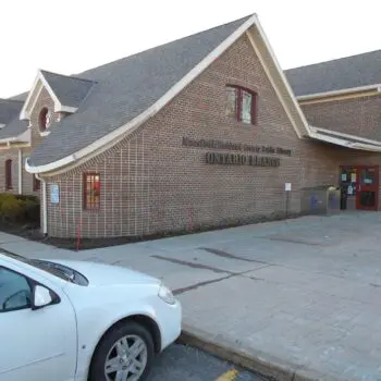 Brick building with shingle roof