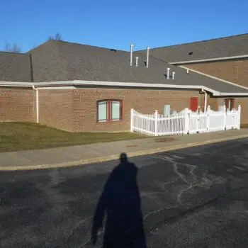 Brick building with shingle roof