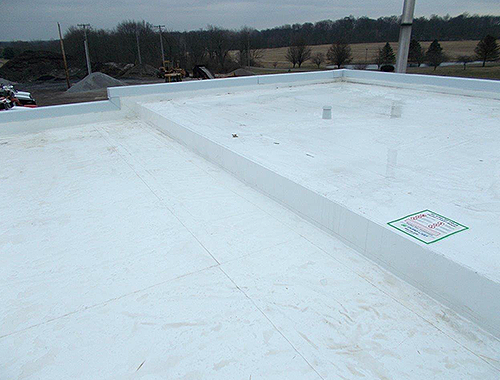 Flat commercial roof installation completed