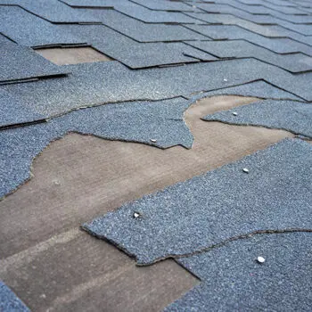 Damaged roof needing repair service