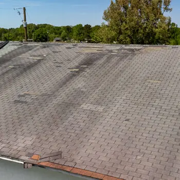 Worn asphalt shingle roof repair