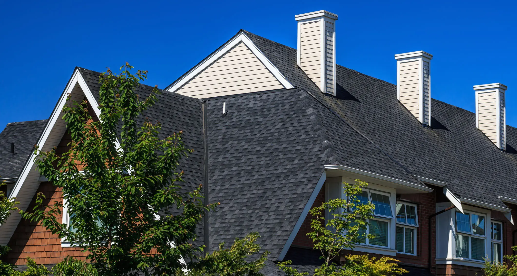 Modern Building House with new shingle roof